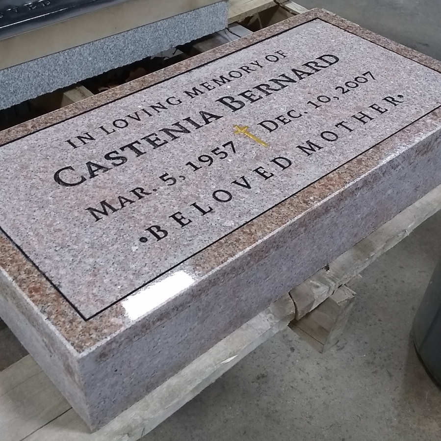 pink granite flat grave headstone